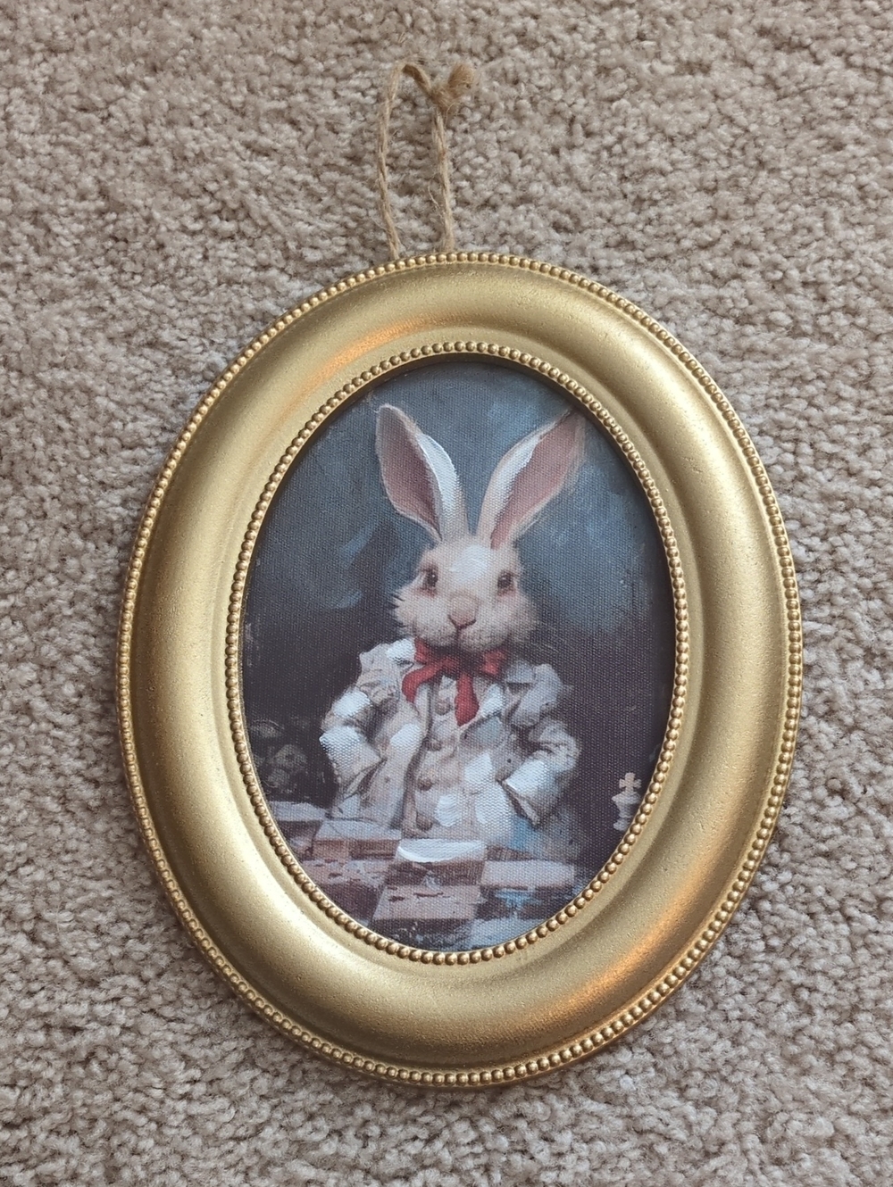 Ashland Gold Oval Rabbit Wall Plaque with Red Bow
